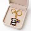 Exklusiver Panda Schlüsselanhänger mit Progress-Flagge – Gold-Edition – LGBTQ+ Pride Accessoire – ProudYou